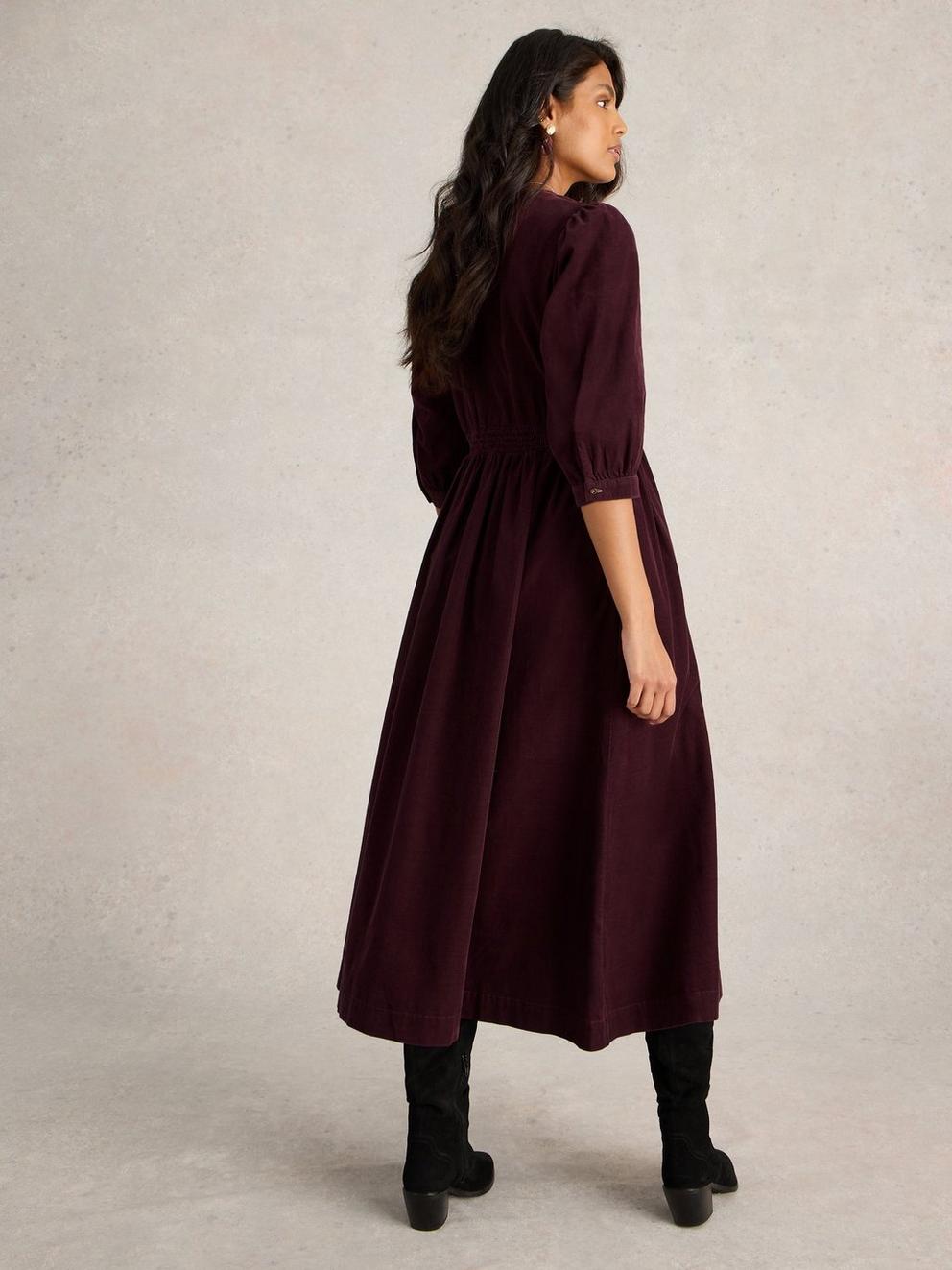 Lucy V Neck Cord Midi Dress in DK PLUM - MODEL BACK