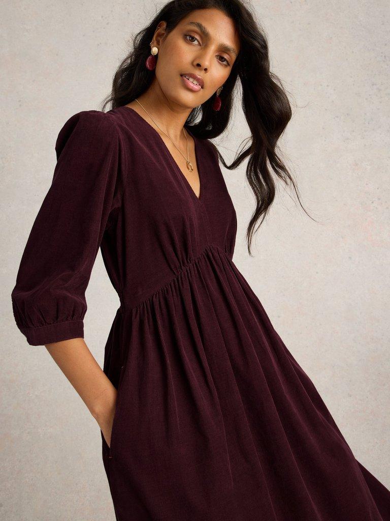 Lucy V Neck Cord Midi Dress in DK PLUM - MODEL DETAIL