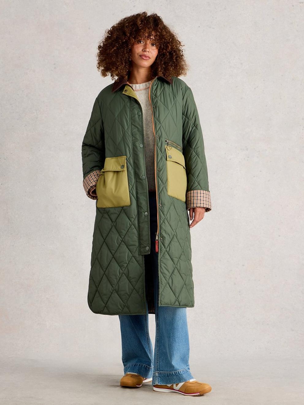 Stella Longline Quilted Coat in DK GREEN - MODEL FRONT