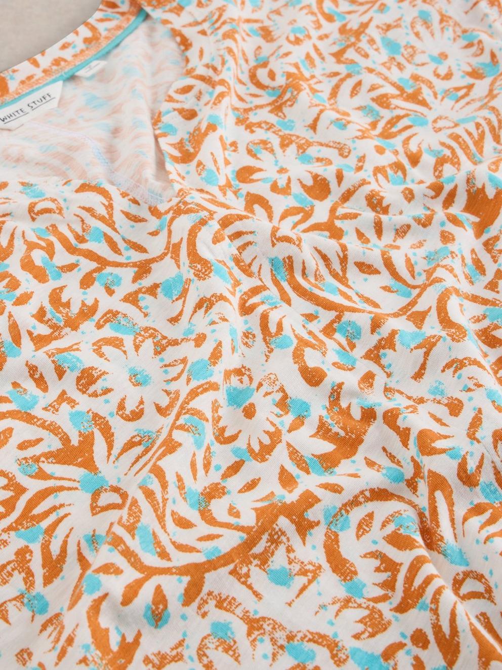 NELLY TEE NOTCH NECK in ORANGE PR - FLAT DETAIL