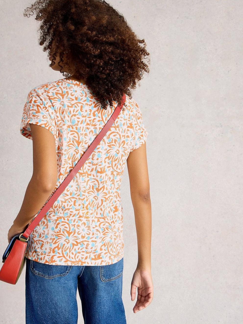 NELLY TEE NOTCH NECK in ORANGE PR - MODEL BACK