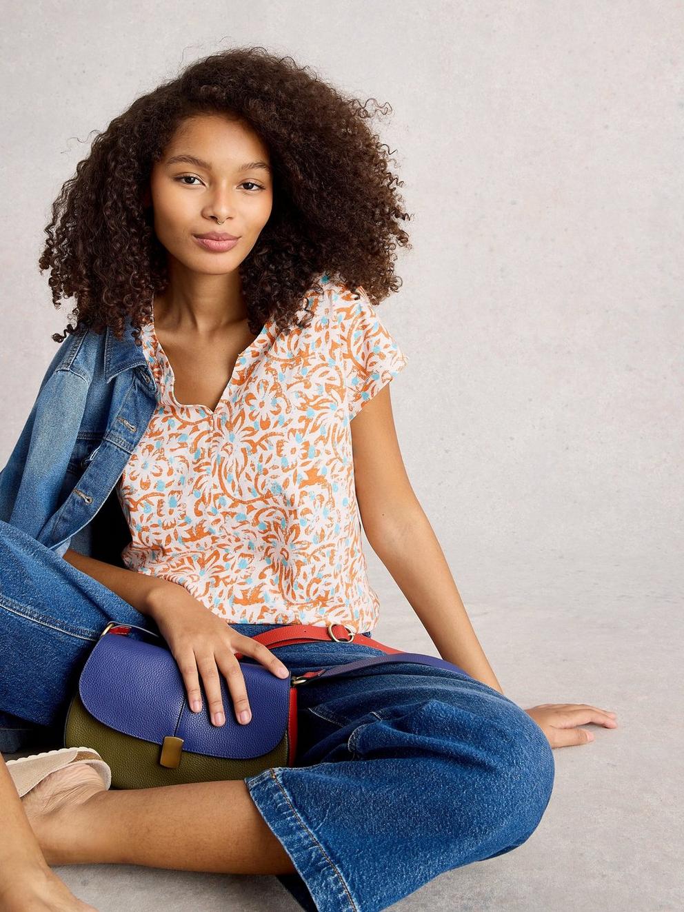 NELLY TEE NOTCH NECK in ORANGE PR - MODEL DETAIL