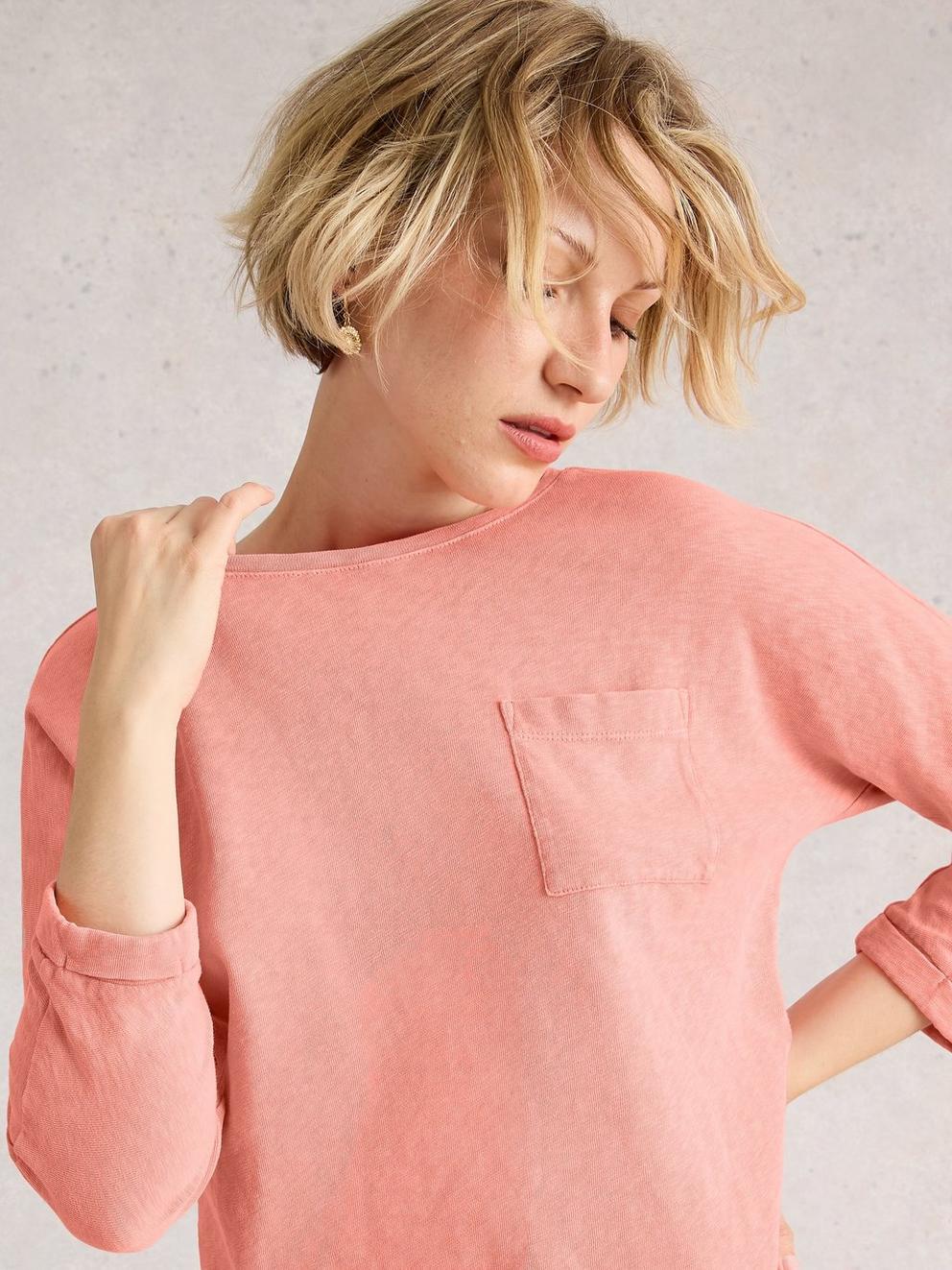 DEMI DOLMAN CREW NECK TOP in MID CORAL - MODEL DETAIL