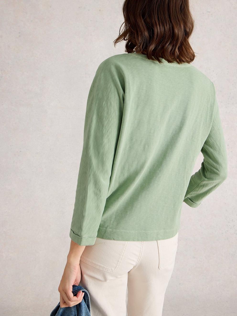 DEMI DOLMAN CREW NECK TOP in MID GREEN - MODEL BACK
