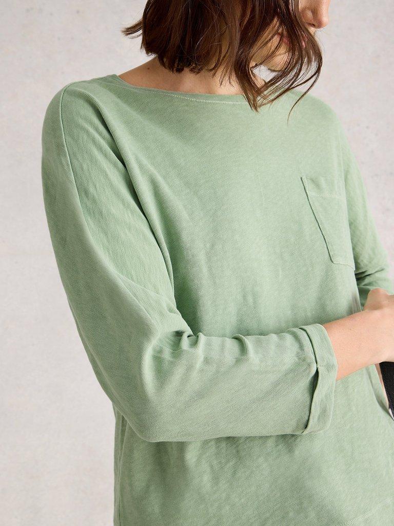 DEMI DOLMAN CREW NECK TOP in MID GREEN - MODEL DETAIL