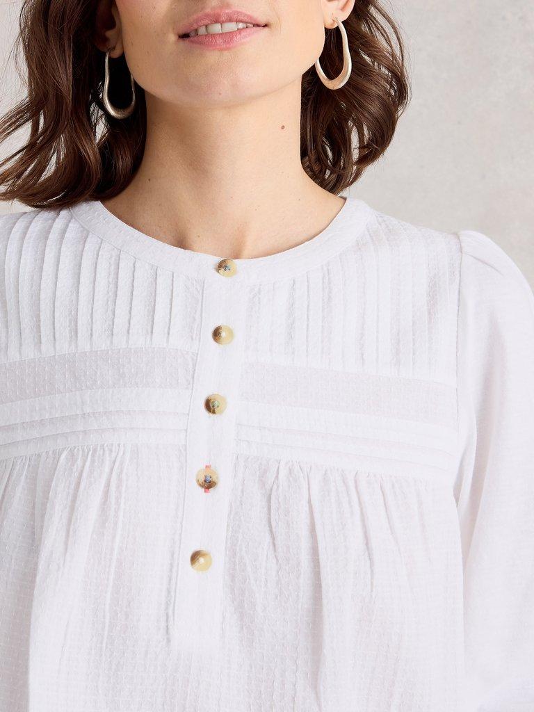 ISLA HALF BUTTON TOP in BRIL WHITE - MODEL DETAIL