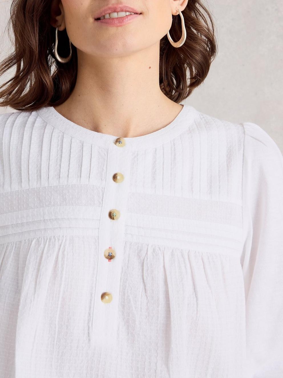 ISLA HALF BUTTON TOP in BRIL WHITE - MODEL DETAIL