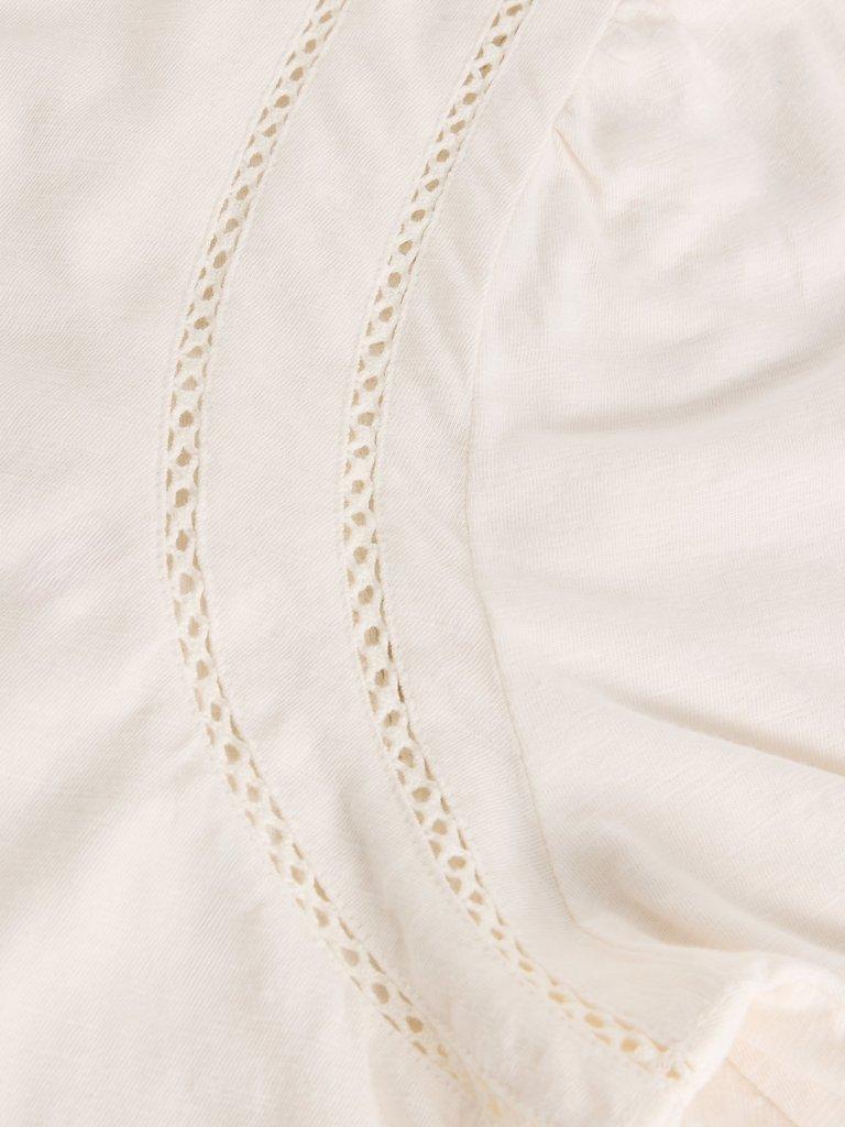 LUCY LADDER TOP in PALE IVORY - FLAT DETAIL