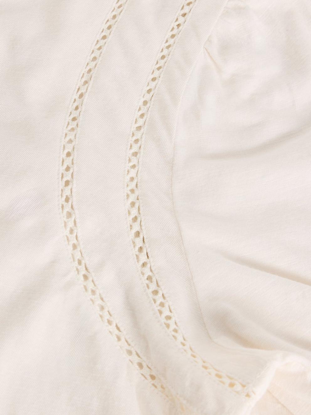 LUCY LADDER TOP in PALE IVORY - FLAT DETAIL