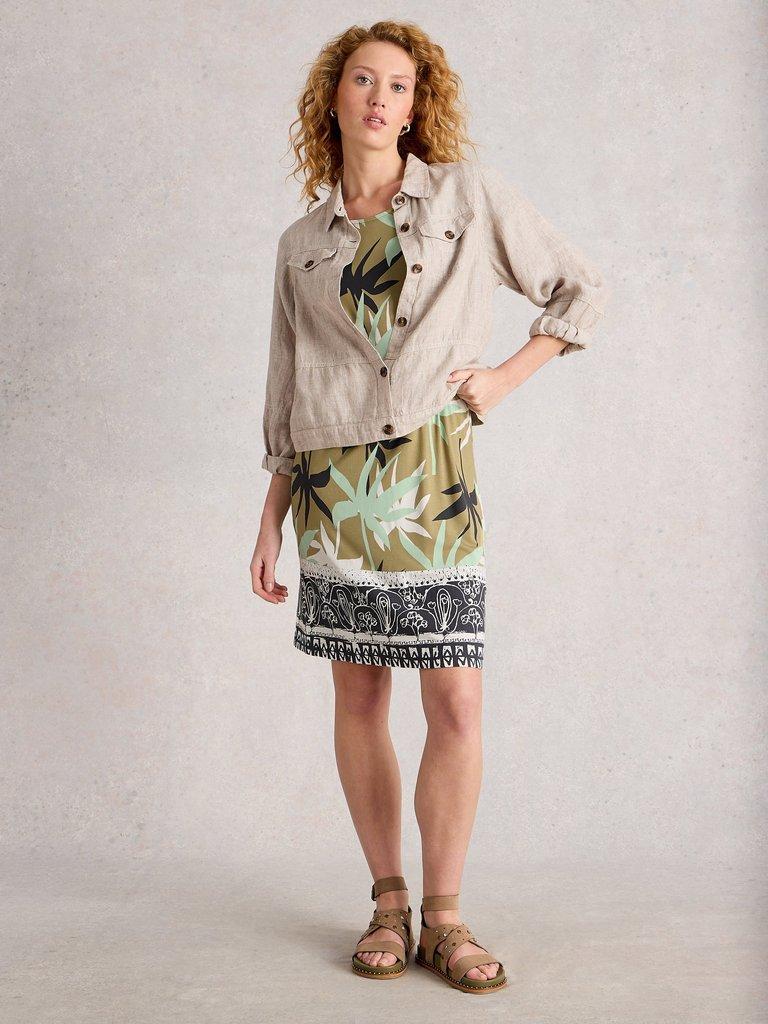 Tallie Jersey Short Sleeve Crew Neck Dress in GREEN MLT - MODEL FRONT