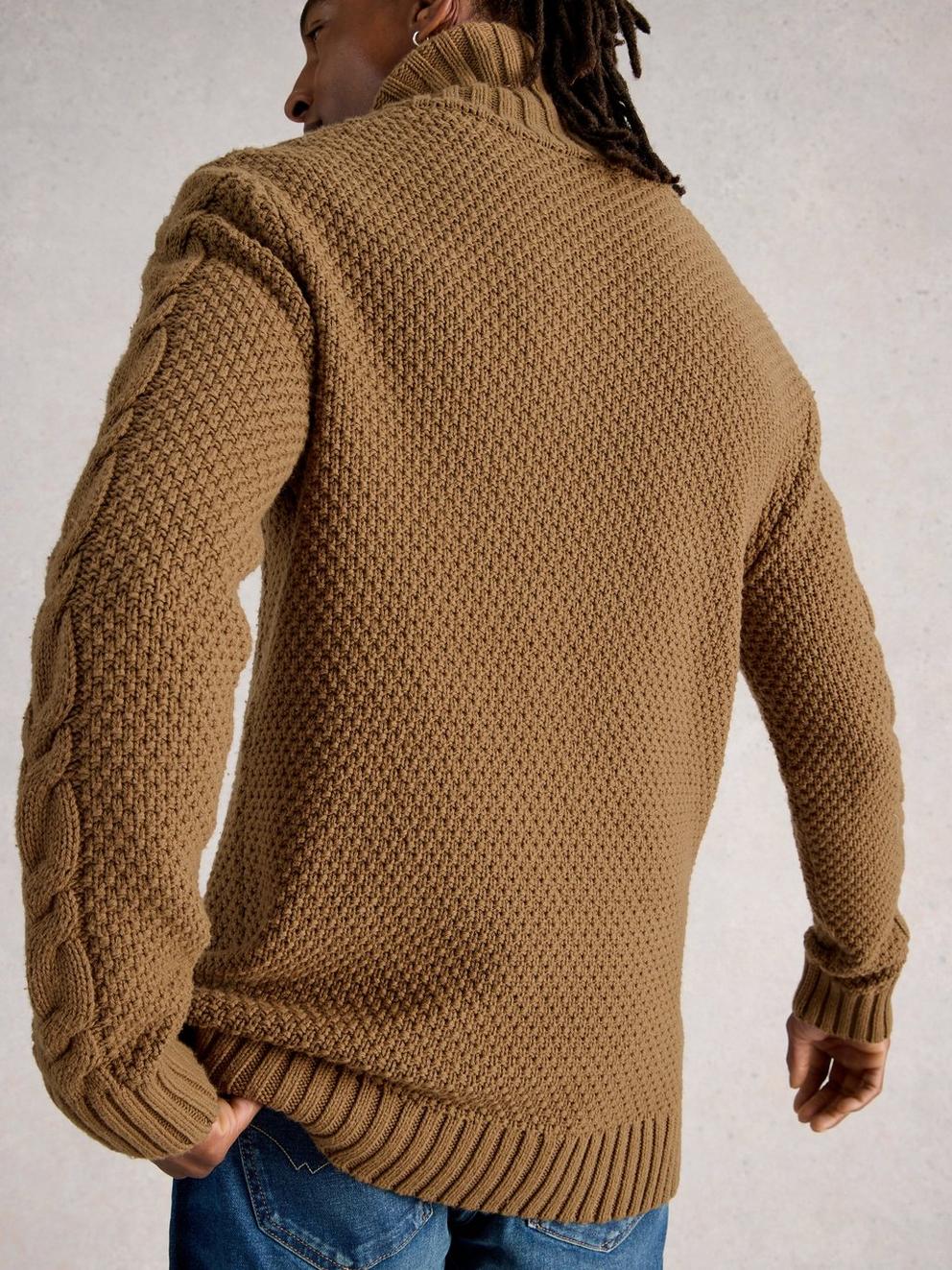 Eden Cable Shawl Neck in MID TAN - MODEL BACK