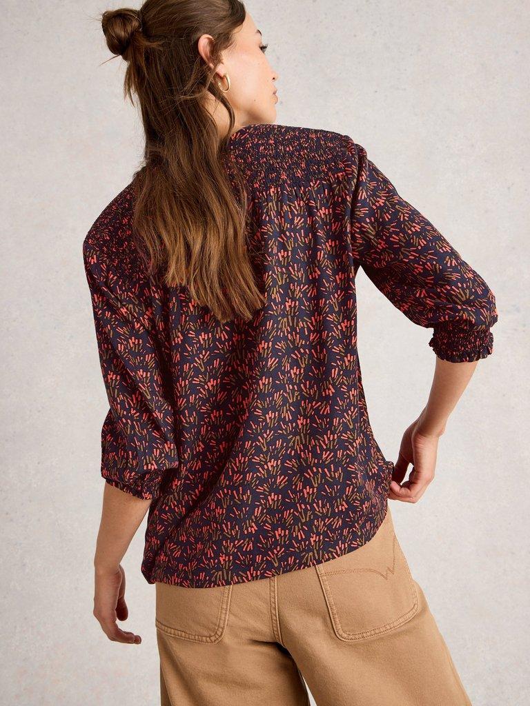 Elisa Print V Neck Top in NAVY MULTI - MODEL BACK