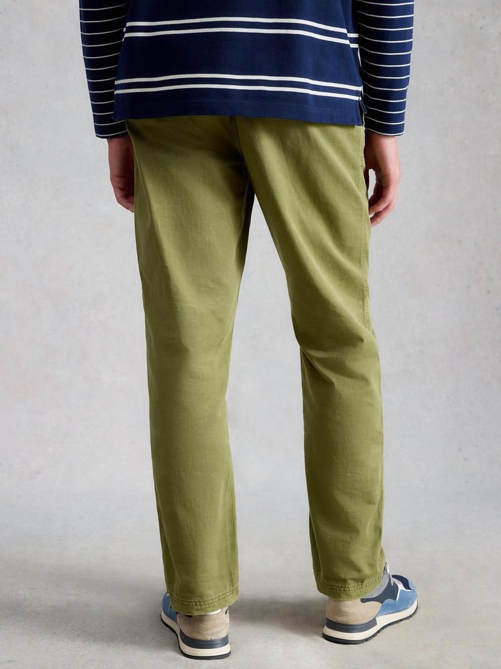 Chapman Casual Trouser in MID GREEN - MODEL BACK