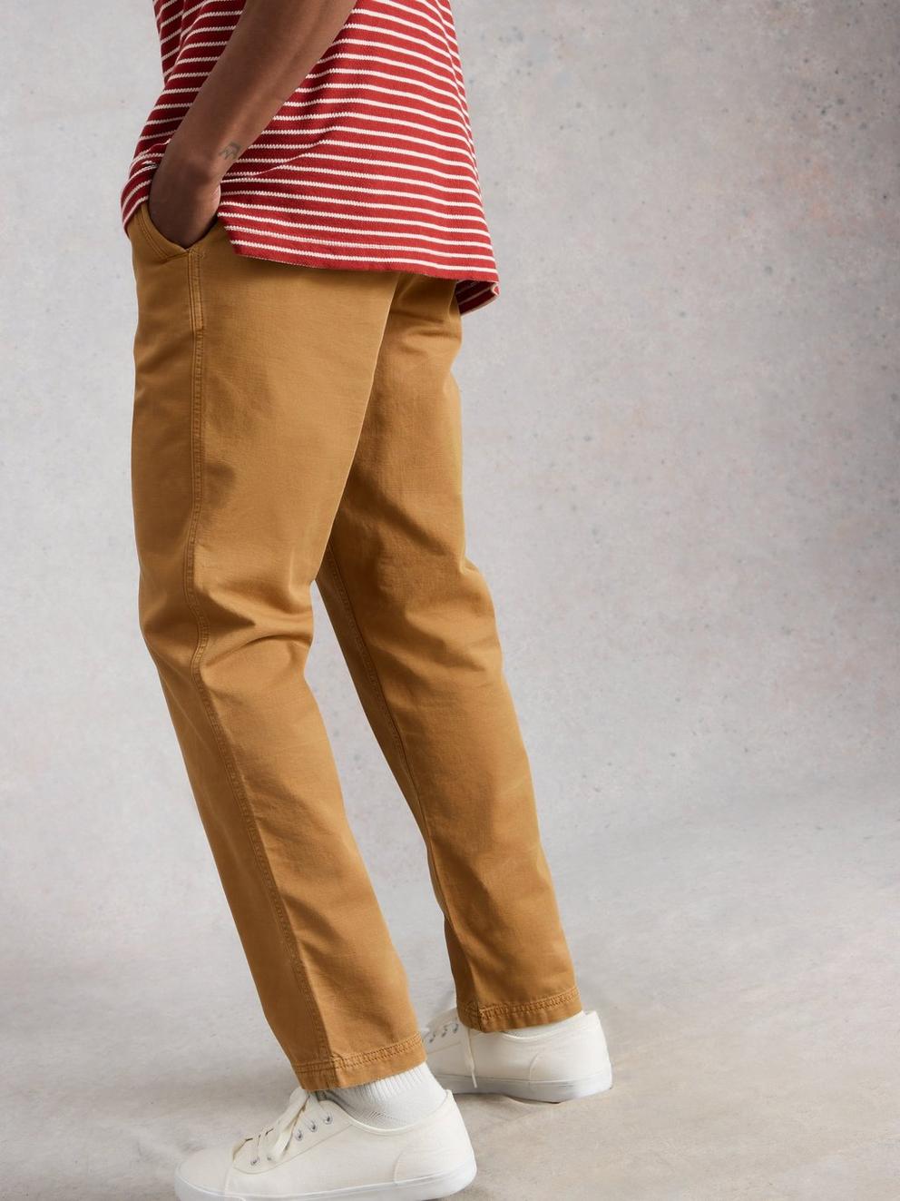 Chapman Casual Trouser in MID TAN - MODEL BACK