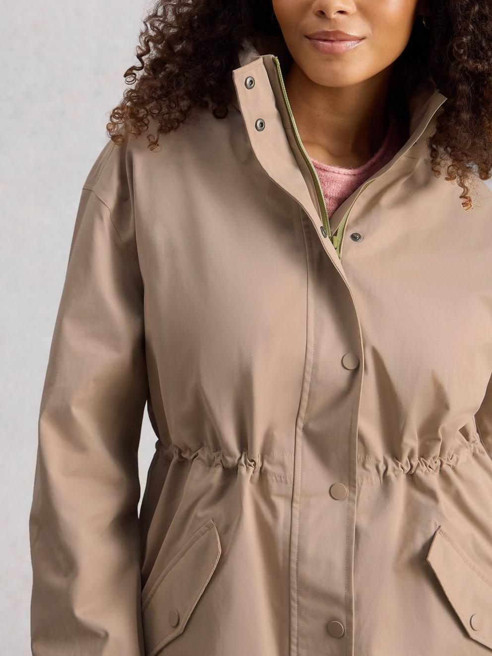 Beth Waterproof Coat in LGT NAT - MODEL DETAIL