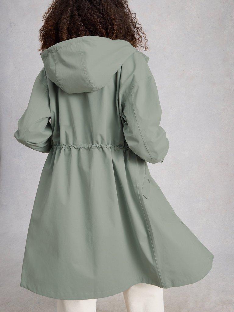 Beth Waterproof Coat in MID GREEN - MODEL BACK