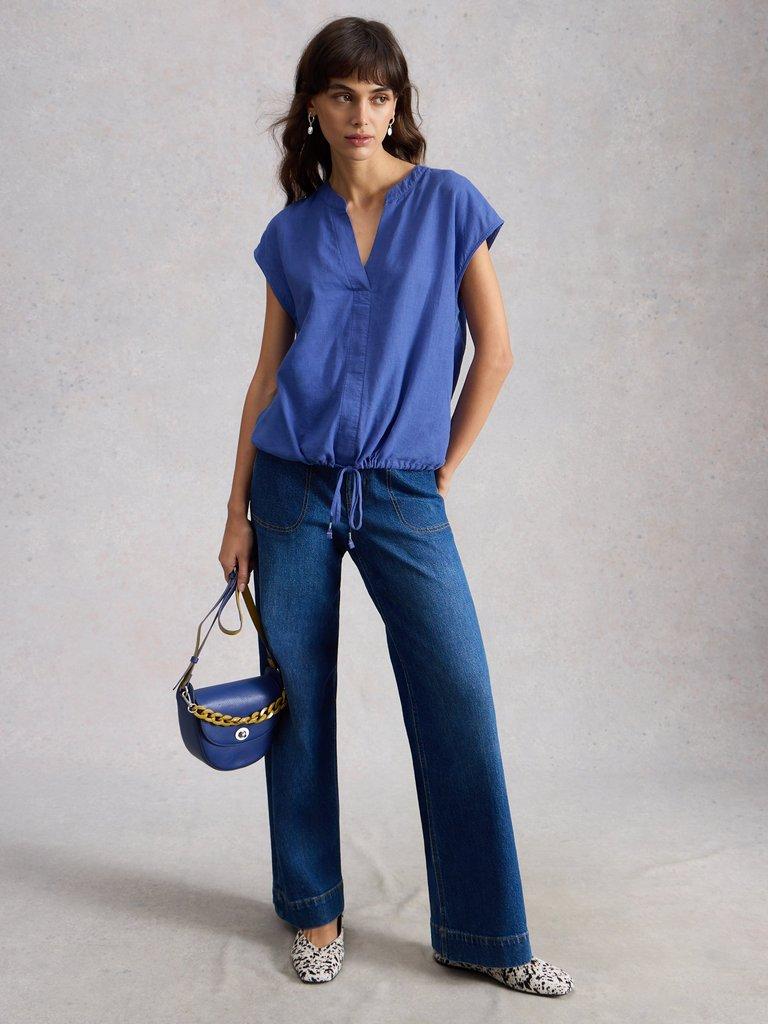 Nicole Linen Blend Notch Neck Top in BRT BLUE - MODEL FRONT