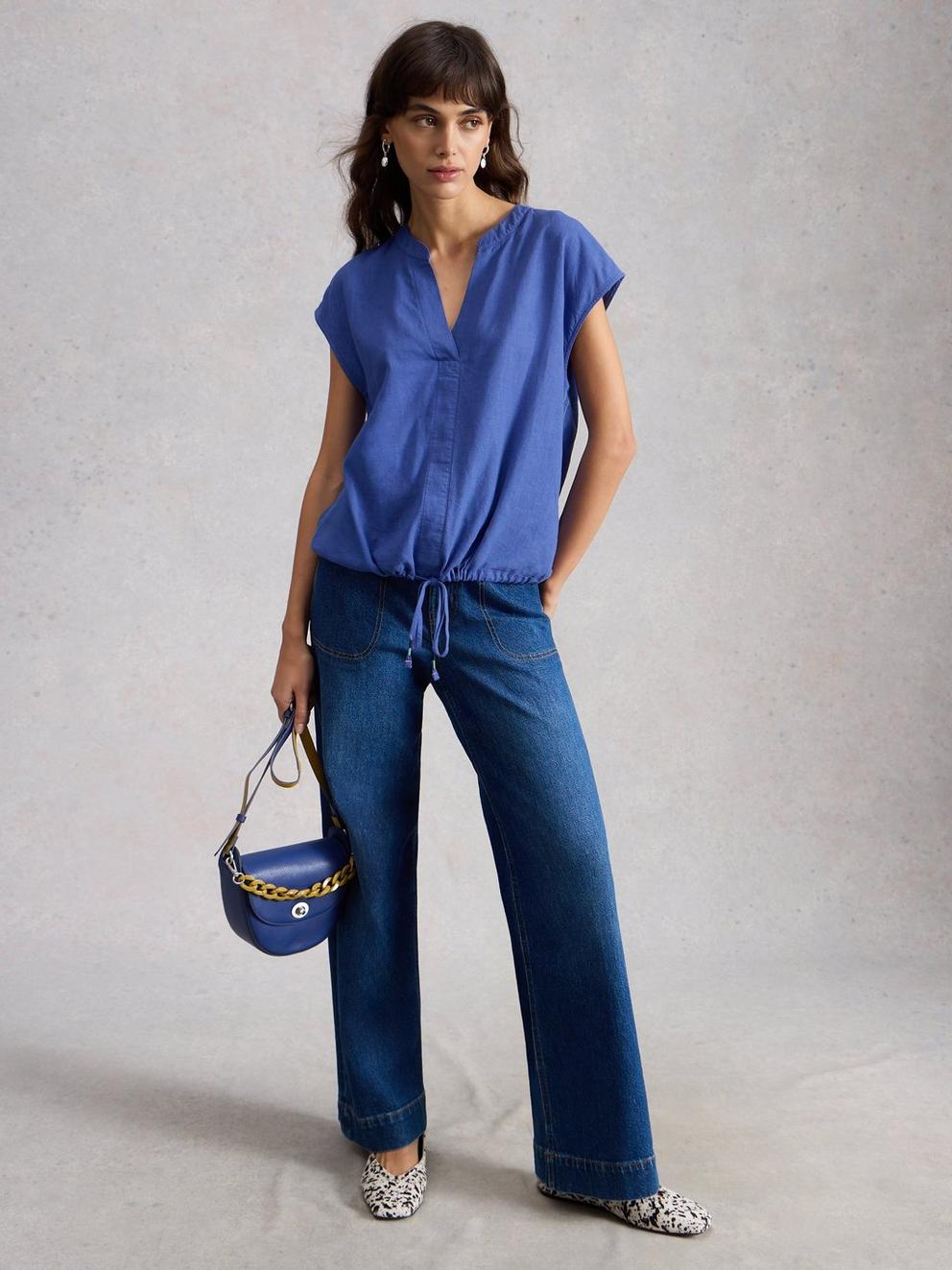 Nicole Linen Blend Notch Neck Top in BRT BLUE - MODEL FRONT