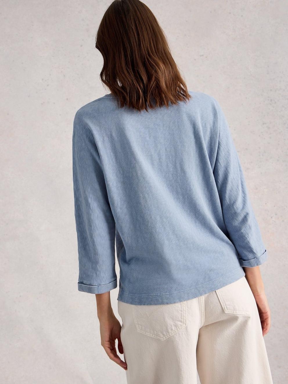 DEMI CREW NECK DOLMAN TOP in MID BLUE - MODEL BACK