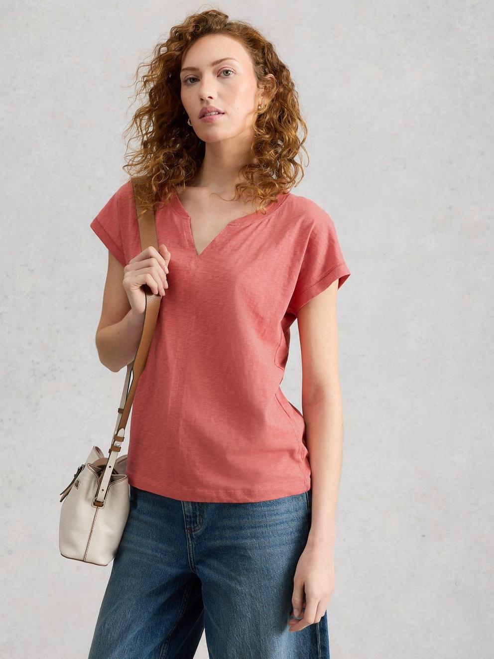 NELLY NOTCH NECK SHORT SLEEVE T-SHIRT in MID PINK - MODEL DETAIL