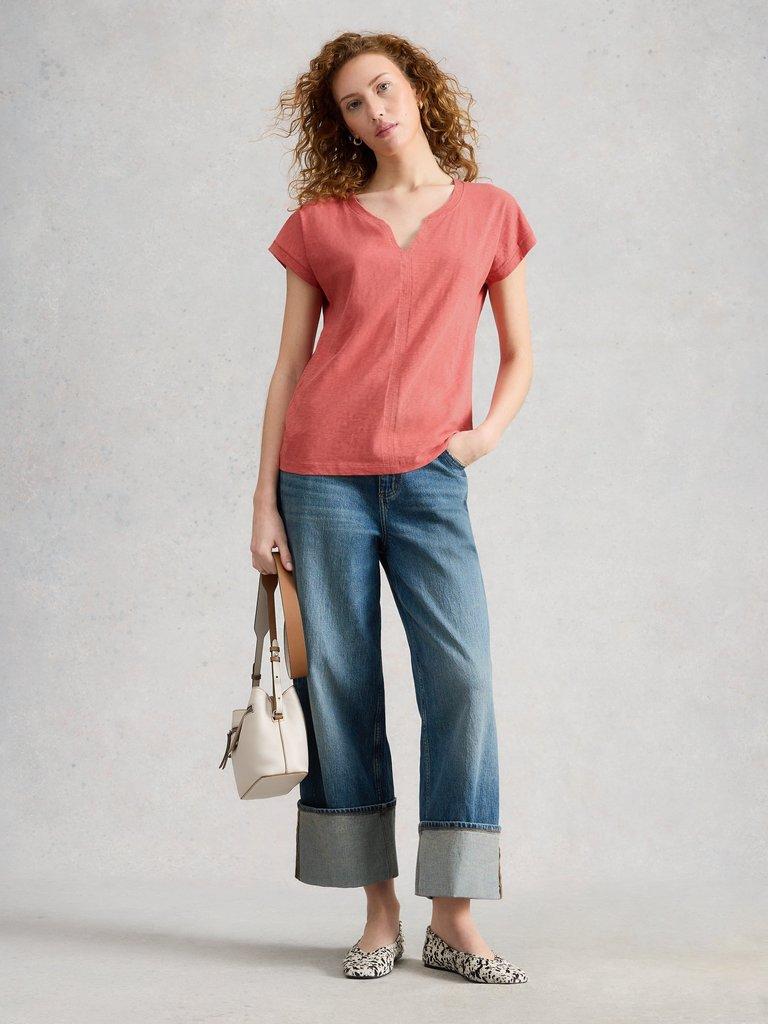 NELLY NOTCH NECK SHORT SLEEVE T-SHIRT in MID PINK - MODEL FRONT