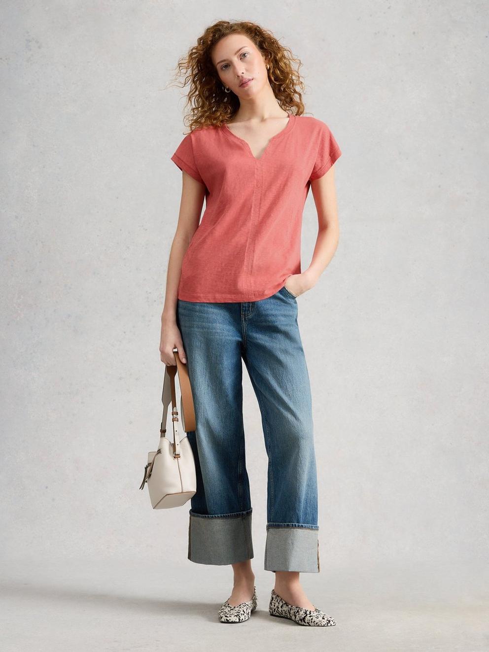 NELLY NOTCH NECK SHORT SLEEVE T-SHIRT in MID PINK - MODEL FRONT