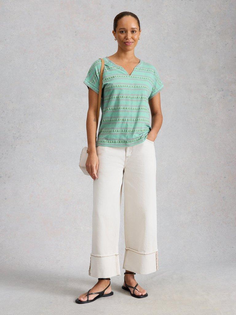 NELLY SHORT SLEEVE EMBROIDERED TEE in TEAL MLT - MODEL FRONT