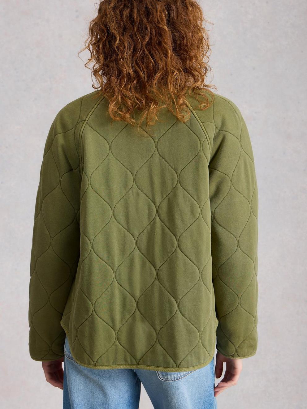 Anya Jersey Quilted Jacket in MID GREEN - MODEL BACK