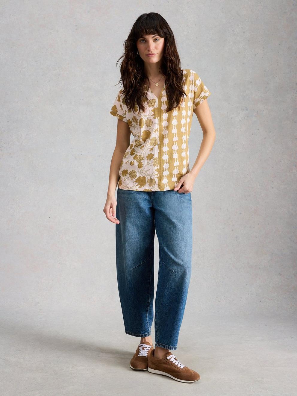 NELLY NOTCH NECK PRINT T-SHIRT in GREEN MLT - MODEL FRONT