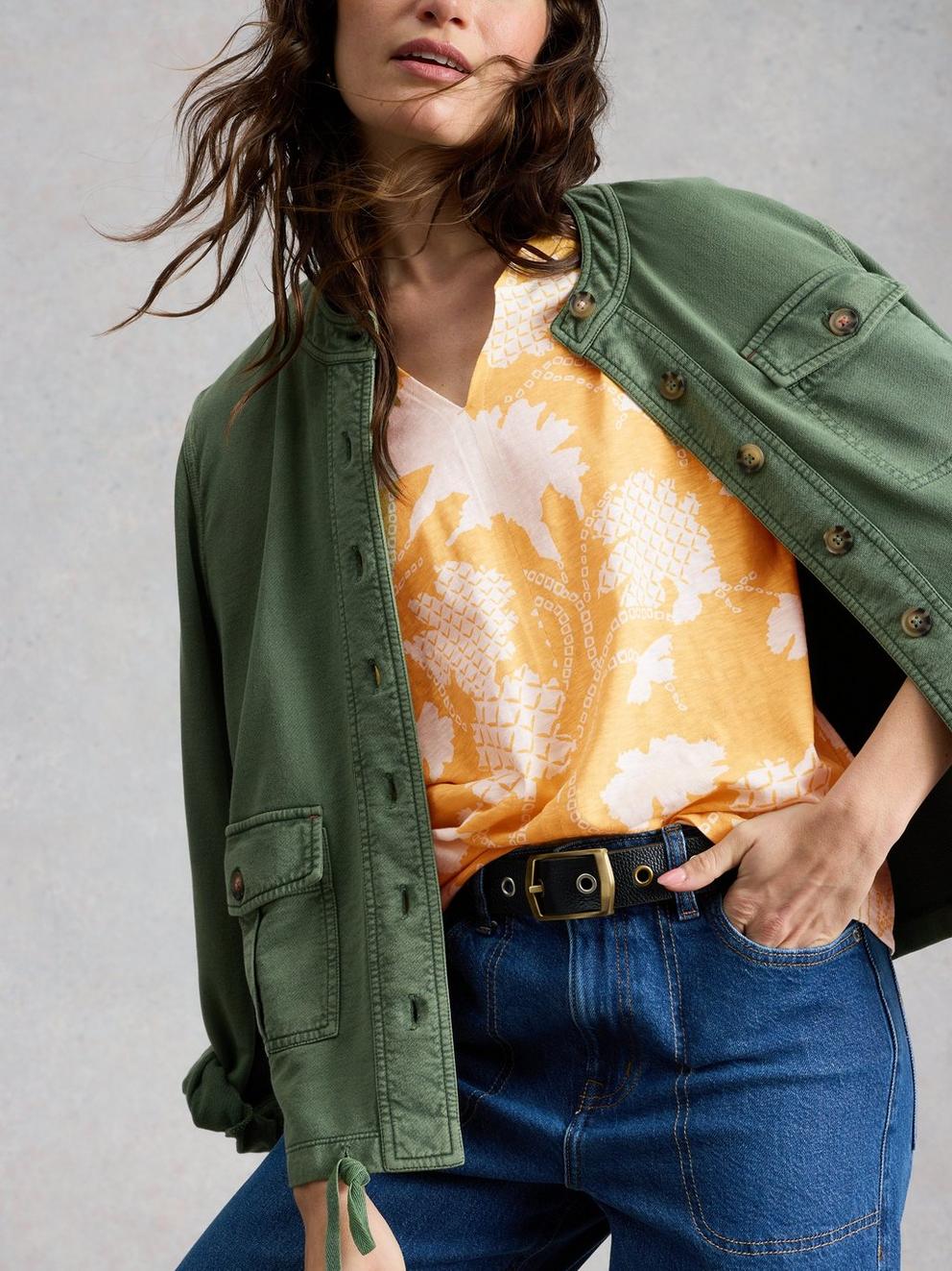 NELLY NOTCH NECK PRINT T-SHIRT in YELLOW PR - MODEL DETAIL