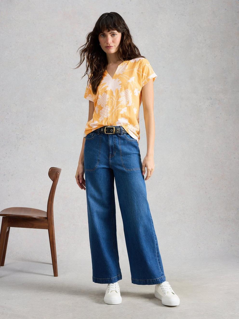 NELLY NOTCH NECK PRINT T-SHIRT in YELLOW PR - MODEL FRONT