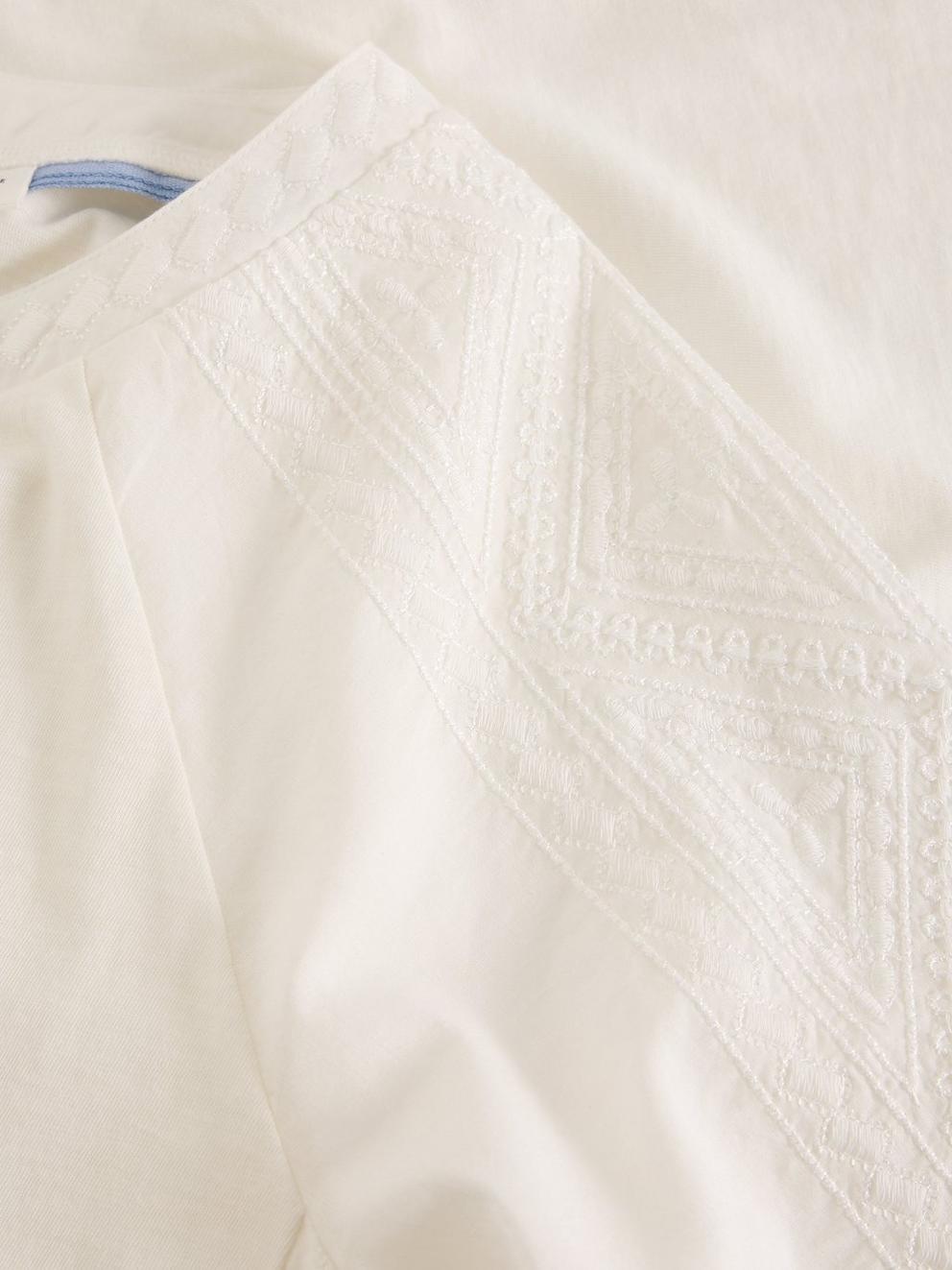 EMBROIDERED TIE HEM CREW NECK TOP in BRIL WHITE - FLAT DETAIL