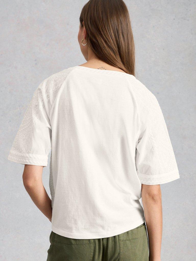 EMBROIDERED TIE HEM CREW NECK TOP in BRIL WHITE - MODEL BACK