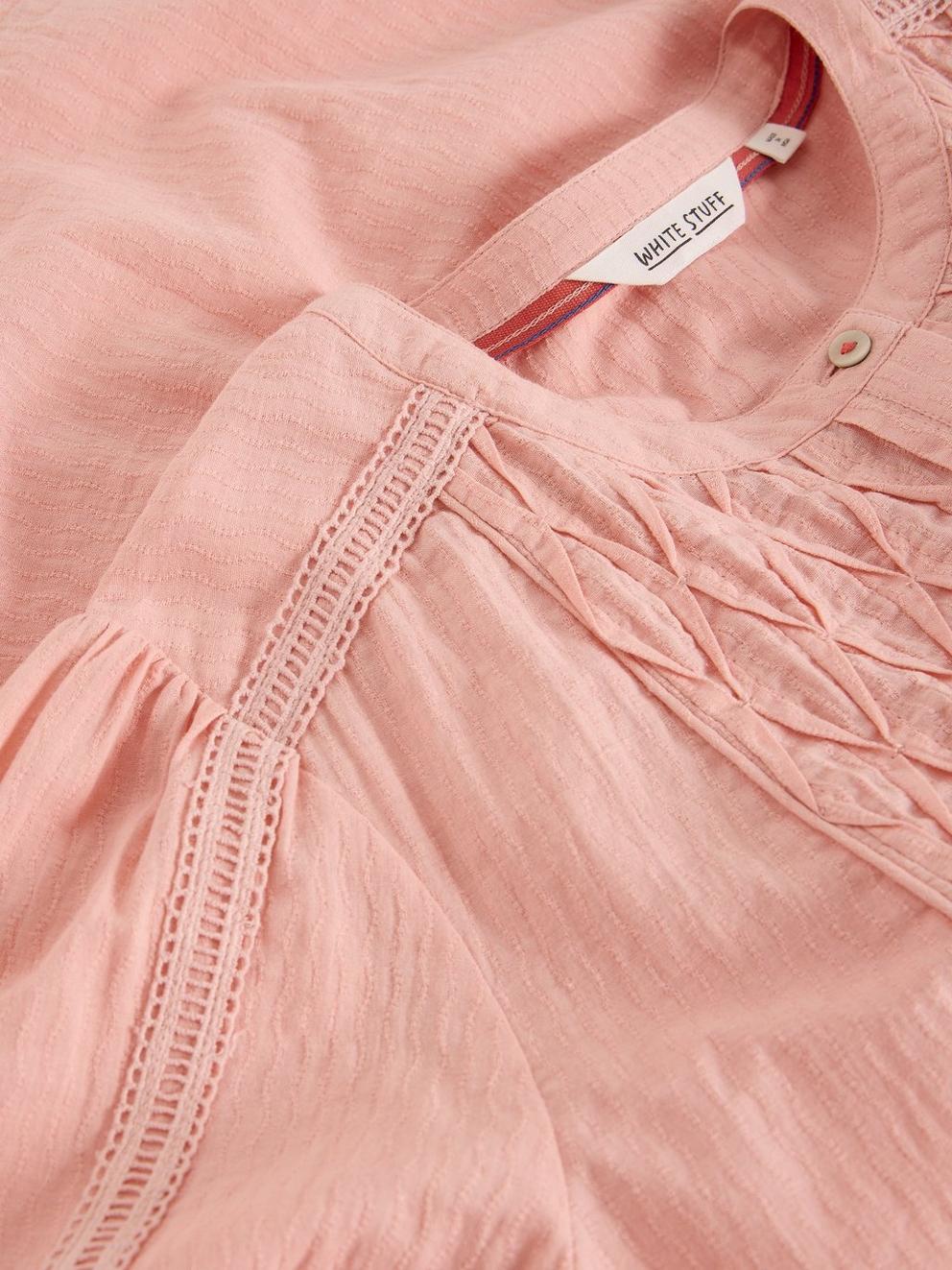 Rachel Smock Top  in MID PINK - FLAT DETAIL