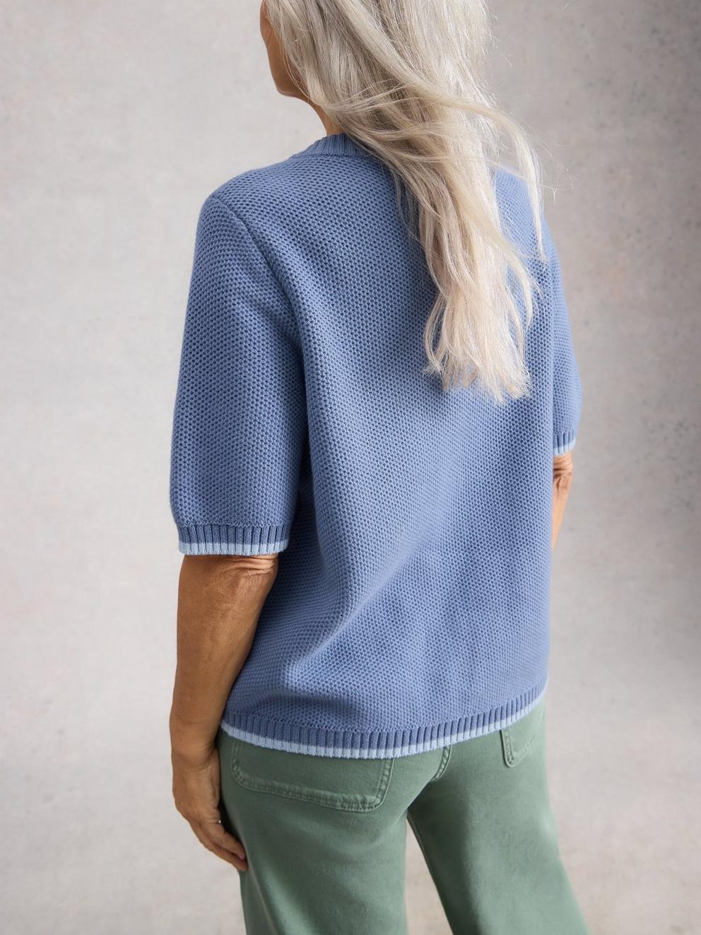 ISABELLA SHORT SLEEVE CARDI in MID BLUE - MODEL BACK