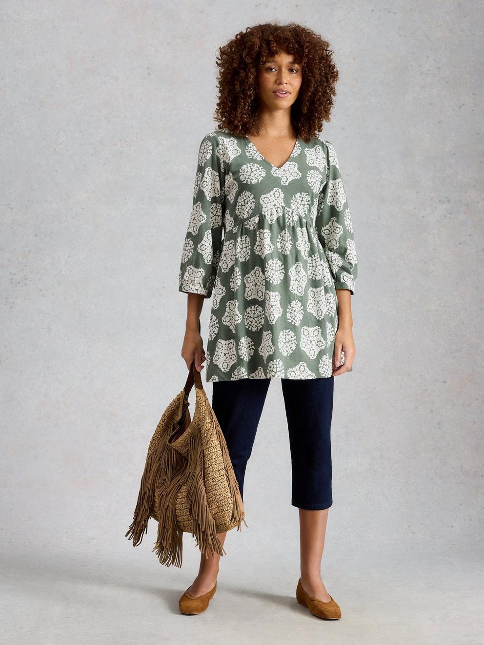 LARA V NECK SHORT SLEEVE TUNIC in GREEN PR - MODEL FRONT
