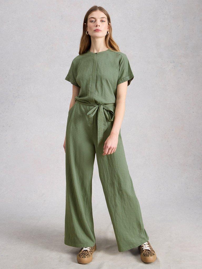 Sandy Jersey Jumpsuit in DUS GREEN - MODEL FRONT