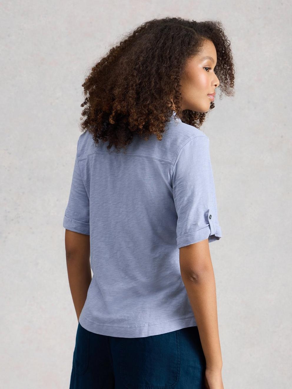 ALLIE EMBROIDERED SS SHIRT in MID BLUE - MODEL BACK