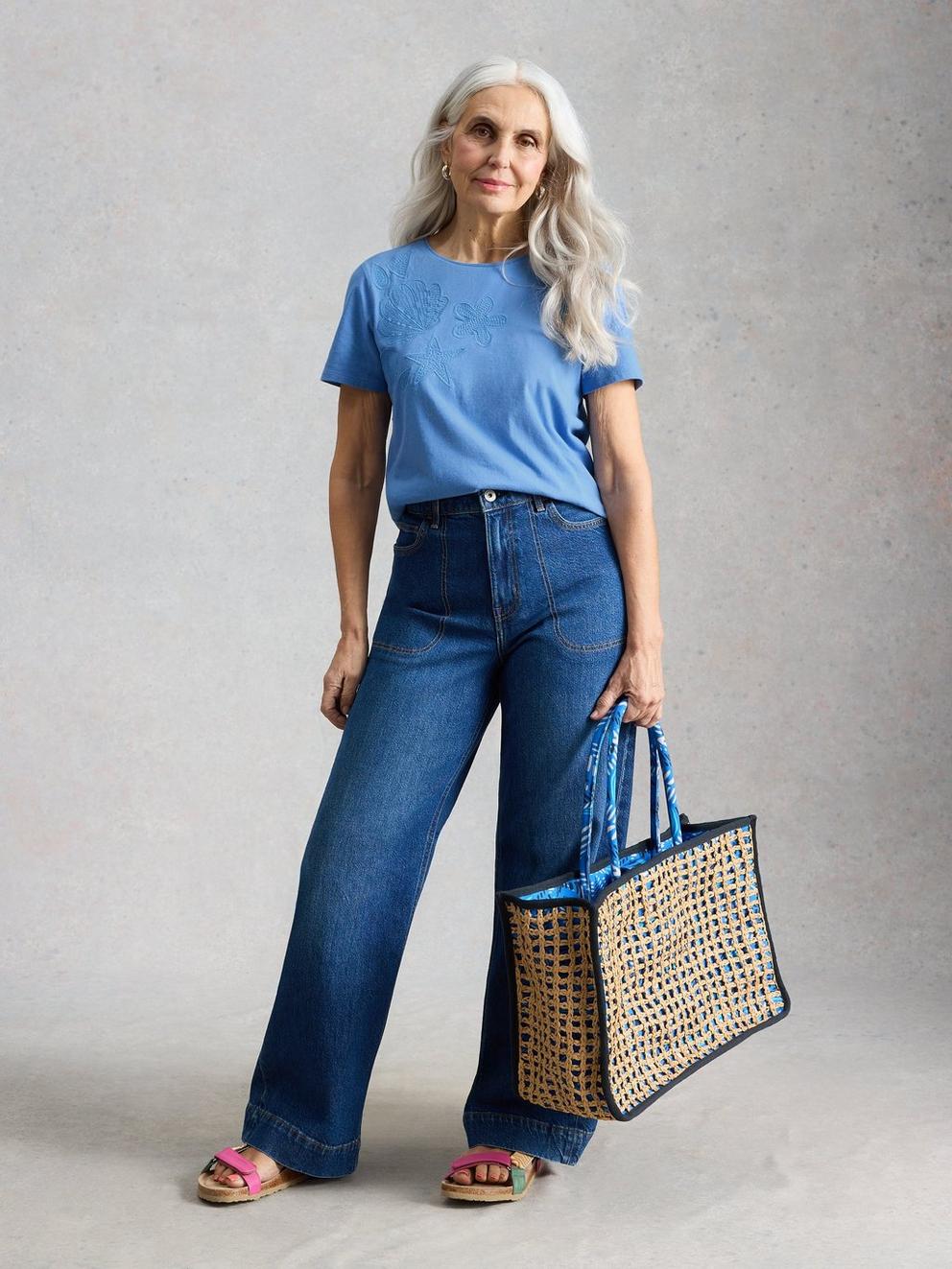 ABBIE EMBROIDERED T-SHIRT in MID BLUE - MODEL FRONT