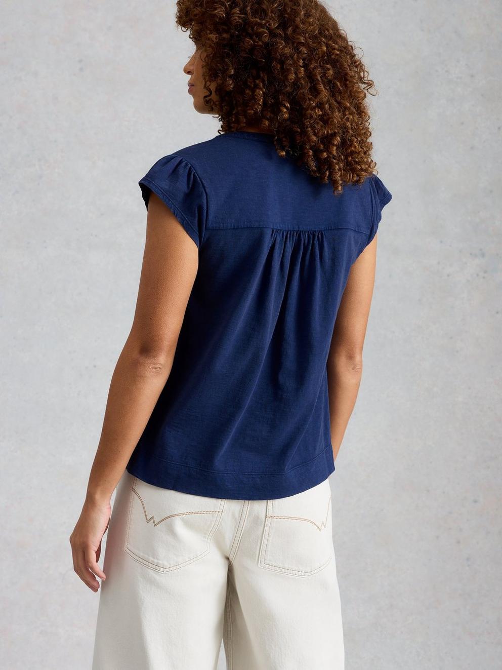 AMELIA EMBROIDERY TOP in INDIGO BLE - MODEL BACK
