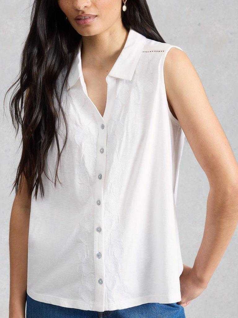 AMY EMB SLEEVELESS SHIRT in BRIL WHITE - MODEL DETAIL