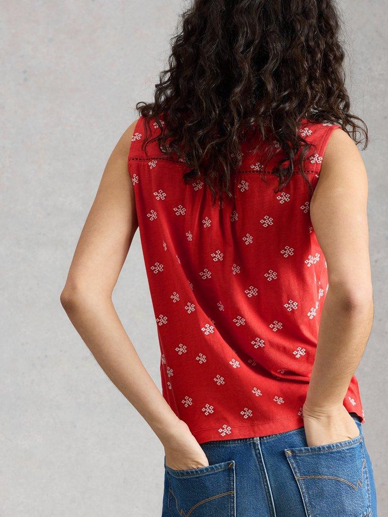 AMY EMB SLEEVELESS SHIRT in RED MLT - MODEL BACK