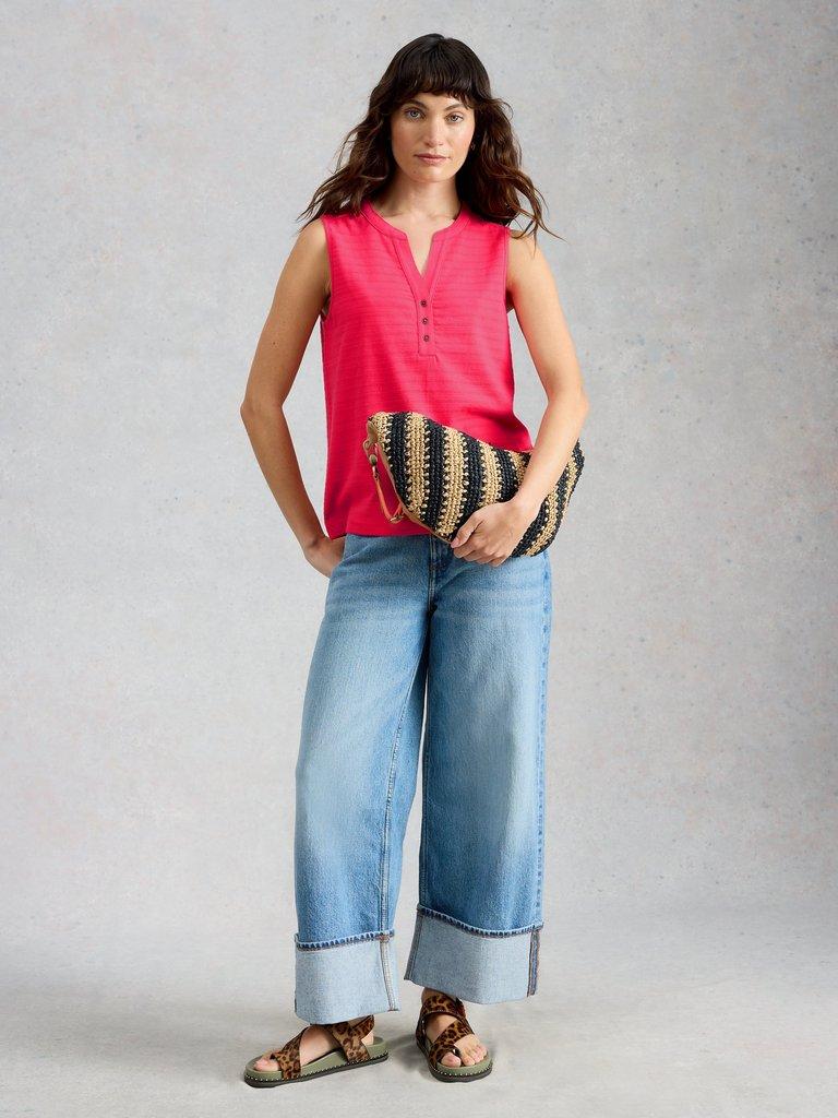 NORA NOTCH VEST in BRT PINK - MODEL FRONT