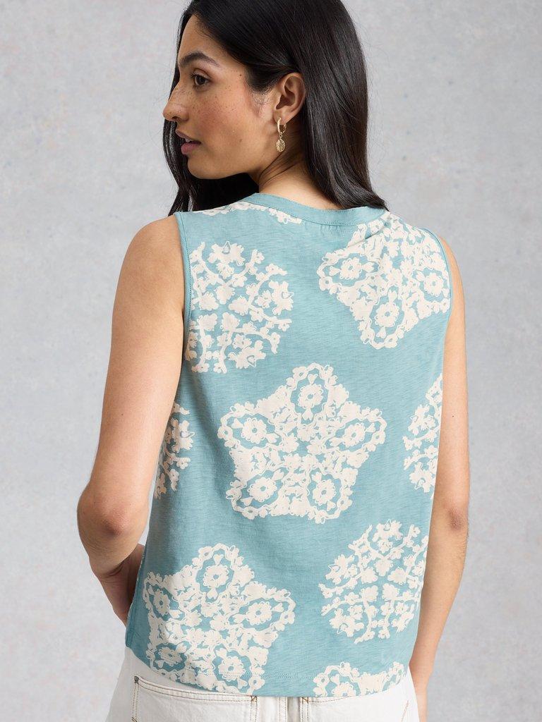 NORA NOTCH VEST in TEAL PR - MODEL BACK