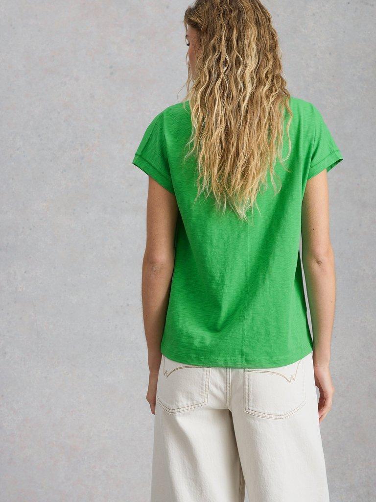 NELLY NOTCH V NECK TEE in BRT GREEN - MODEL BACK