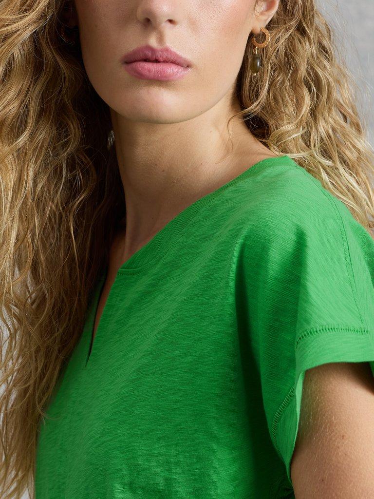 NELLY NOTCH V NECK TEE in BRT GREEN - MODEL DETAIL