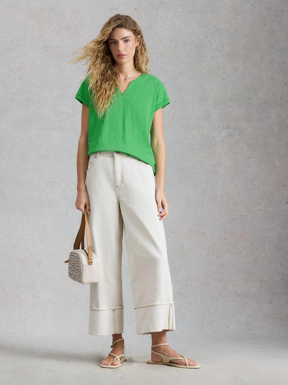 NELLY NOTCH V NECK TEE in BRT GREEN - MODEL FRONT