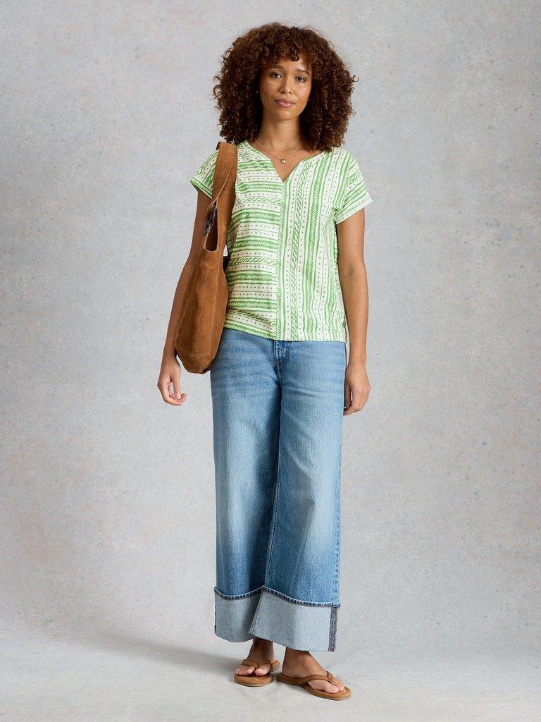 NELLY NOTCH STRIPES TEE in GREEN MLT - MODEL FRONT