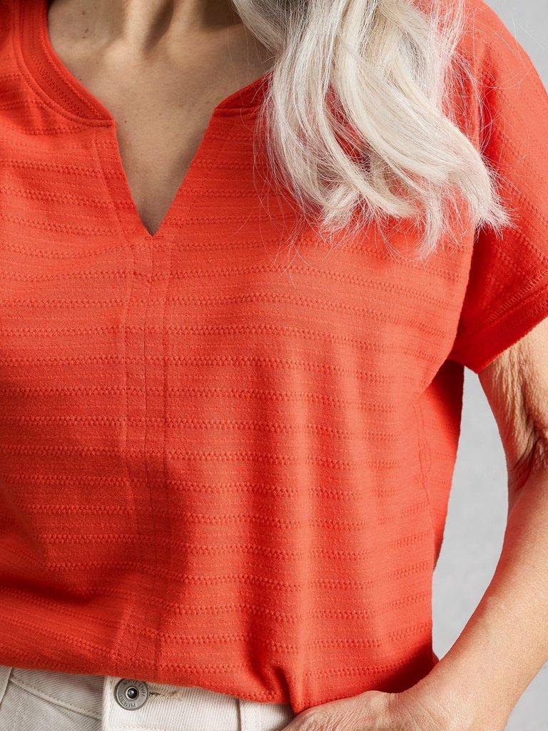 NELLY NOTCH TEXTURE T-SHIRT in BRT RED - MODEL DETAIL
