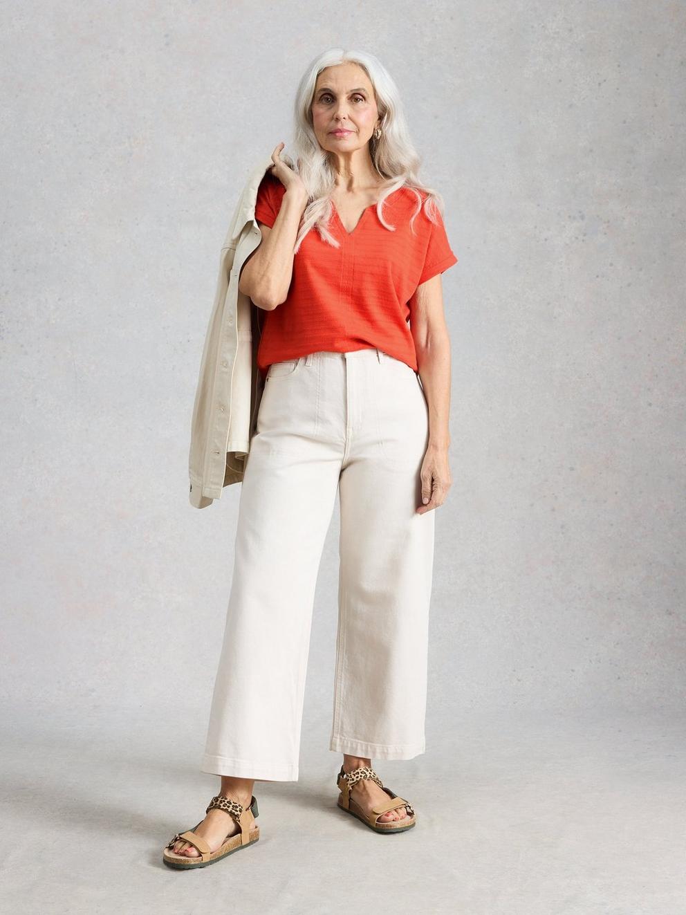 NELLY NOTCH TEXTURE T-SHIRT in BRT RED - MODEL FRONT